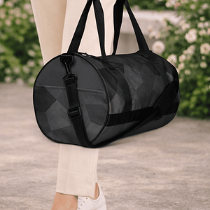 Sac de voyage gris. Compact, structuré et résistant. Idéal pour vos trajets courts et vos séances de sport