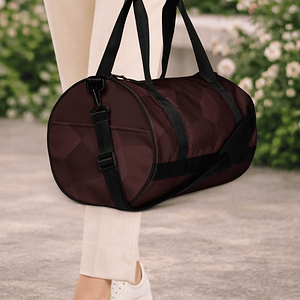 Sac de voyage rouge. Compact, structuré et résistant. Idéal pour vos trajets courts et vos séances de sport