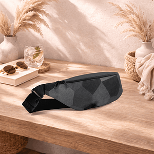 Sac banane gris compact, pratique et élégant. Idéal pour garder vos essentiels à portée de main.